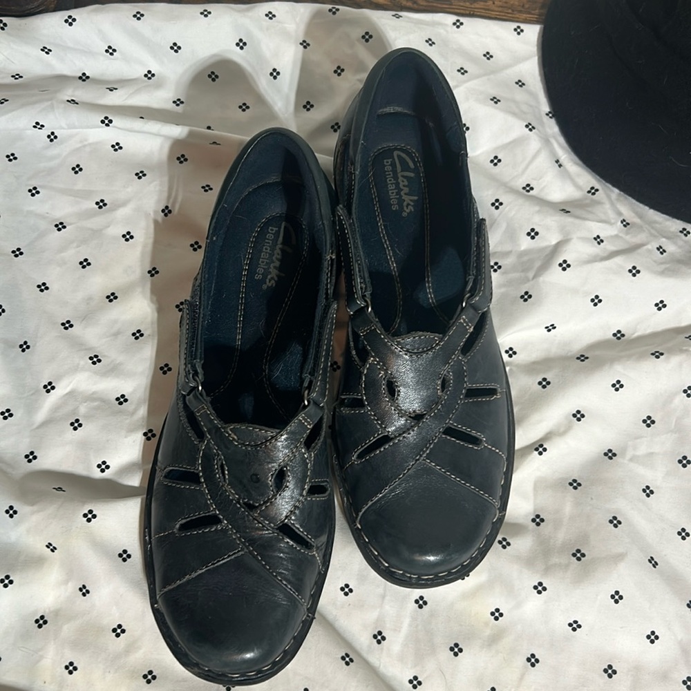 Leather Clark’s with Velcro adjust on either side like new 8.5